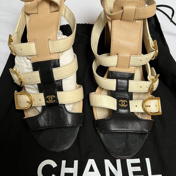 CHANEL
Beige/Black Leather Open-Toe Buckle Sandals - Picture 2 of 5